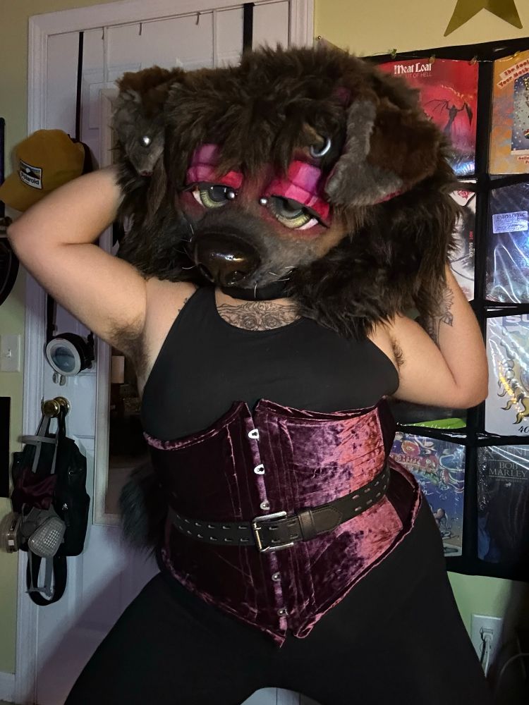 Similar to first photo but her hands are behind her big mane 