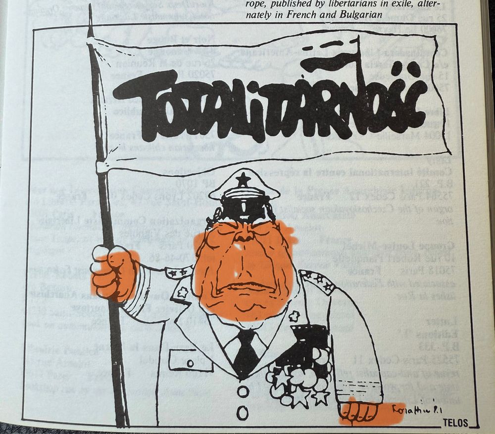 1983 political carton of apoarent north Korean military man holding banner that says totalitarnosc in Polish