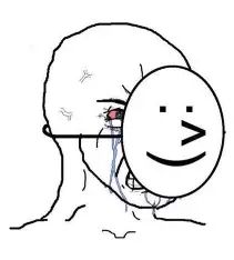 Person crying underneath a face mask of a person smiling