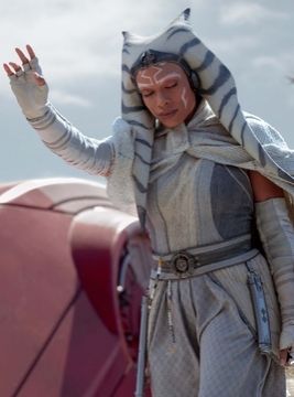 The image shows the fictional Star Wars character Ahsoka the White, who concerted and uses the Force.