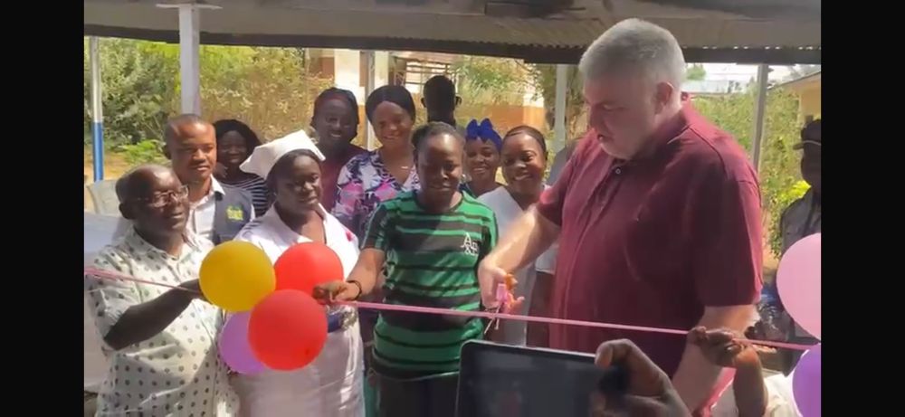 An emotional Dr Conroy cuts the ribbon on the Boe Conroy Mothers Dormitory 