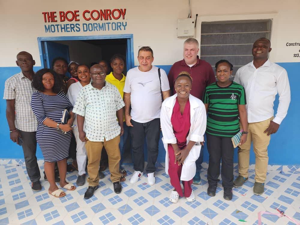 Dr Niall Conroy (red polo shirt) and the maternity team outside the Boe Conroy Mothers Dormitory in the largest hospital in the region in Sierra Leone