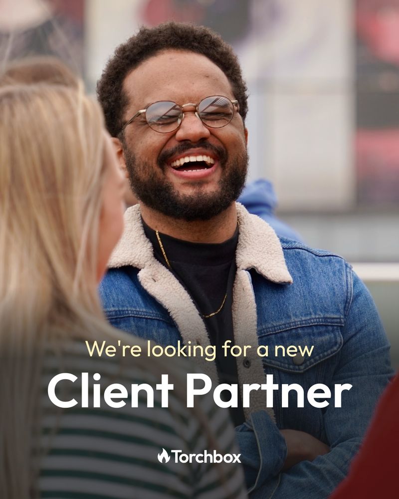 Photograph of Michael laughing with the Torchbox logo overlaid and wording that says 'We're looking for a new Client Partner'. 