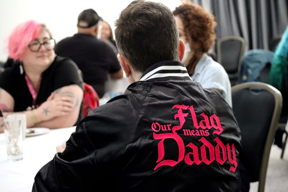 david jenkins in a ‘our flag means daddy’ jacket for the breakfast meet & greet