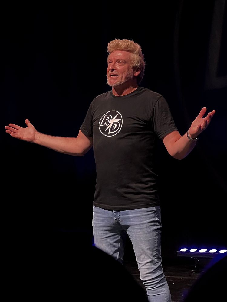 rhys on stage at the end of his legend returns show