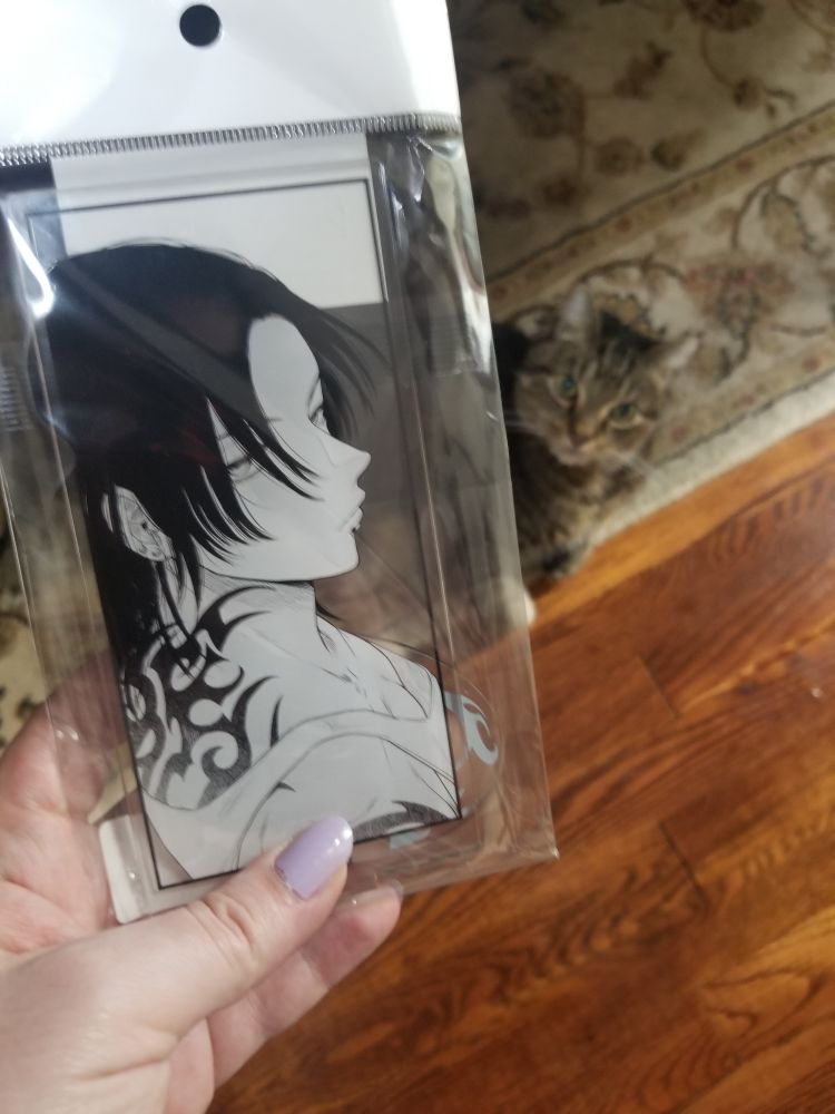 Acrylic stand to "How to deal when your intimidating neighbor is actually an Omega".