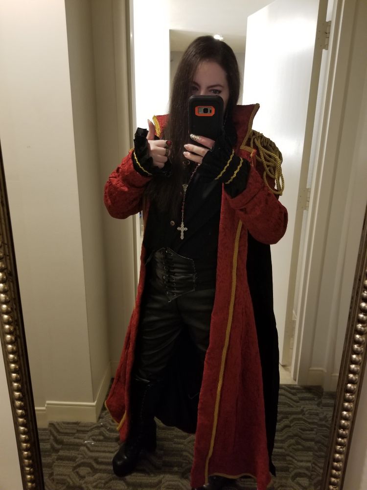 Charity ball fit. 
Black pants with black shirt and cummerbund, with red coat over top.