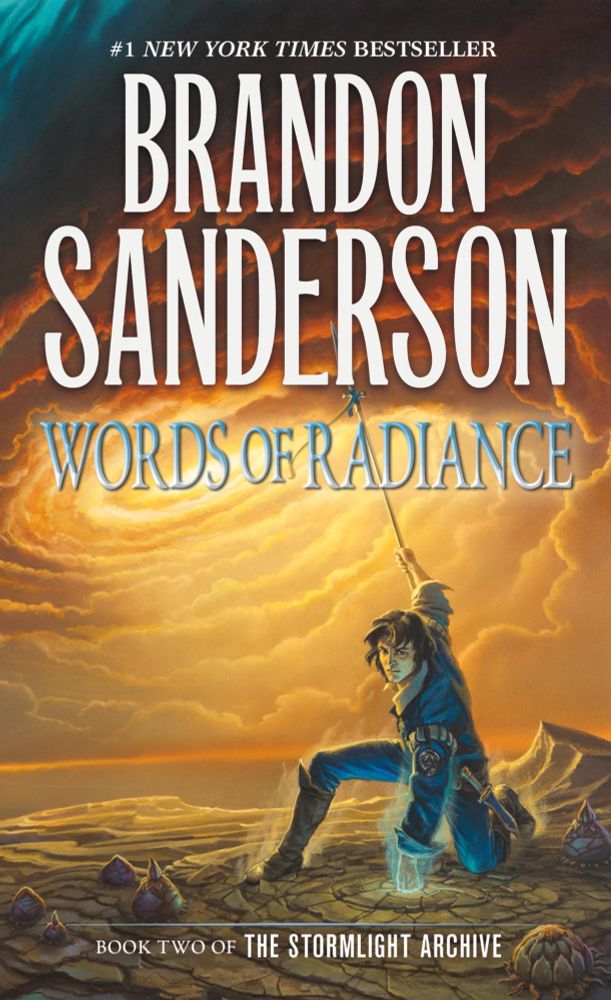 Cover of Words of Radiance by Brandon Sanderson. A man in blue kneels on cracked ground beneath a swirling orange sky.