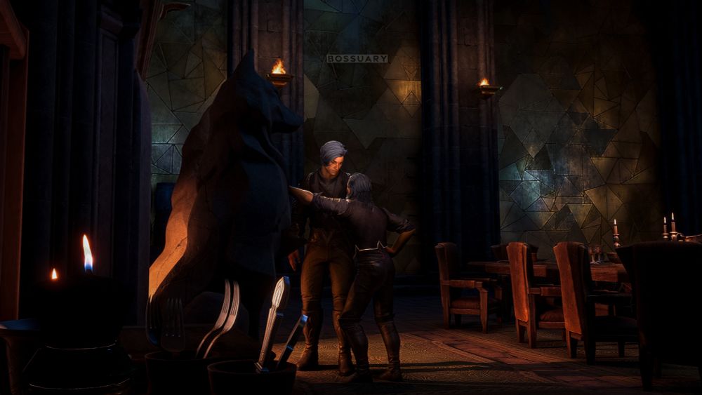 A wider angle shot from within the kitchen area, showing not just the two men speaking intimately at the fireplace, but also the entire dining table with its disarrayed chairs, and the high, mosaic walls. Evariste leans into Lucanis as if discussing something private. In the foreground are cups full of utensils and a few low-burning candles.