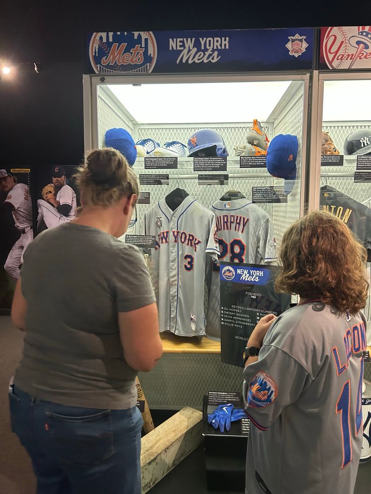 Two Mets fans at the half of fame 