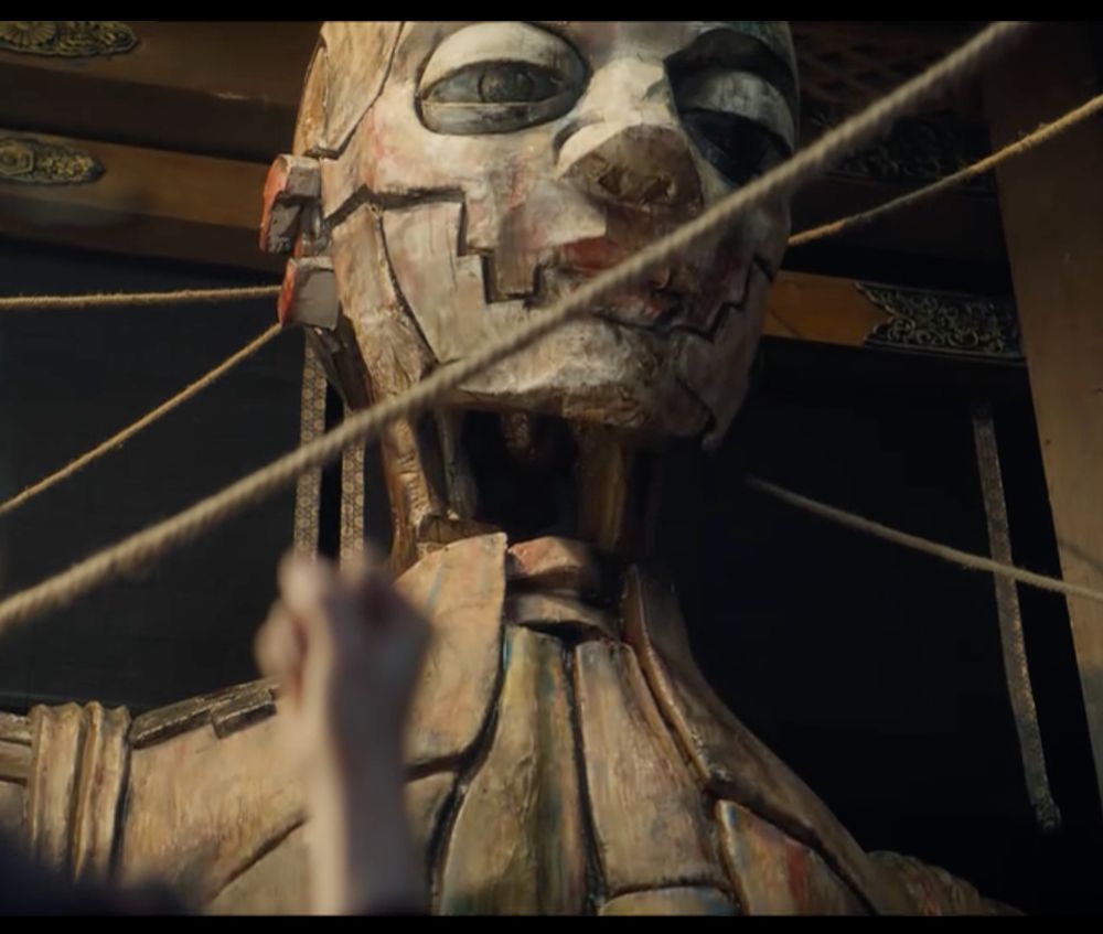 a picture of a giant doll that resembles the attack on titan giant man-eating humanoids