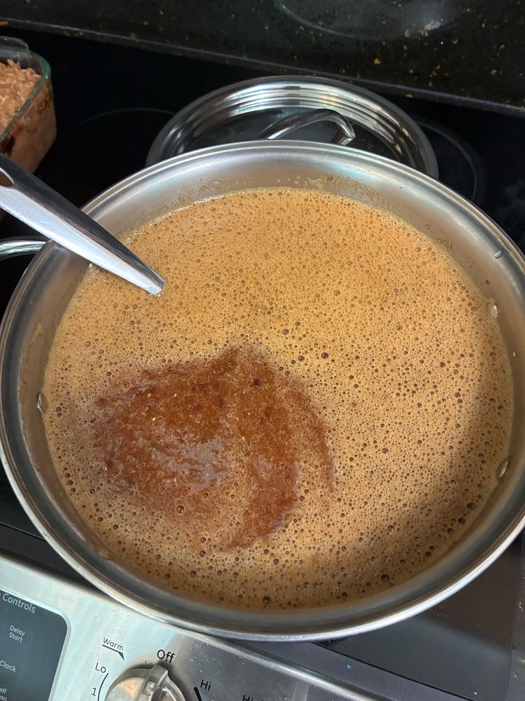 A pot of blenderized plums ready to cook.