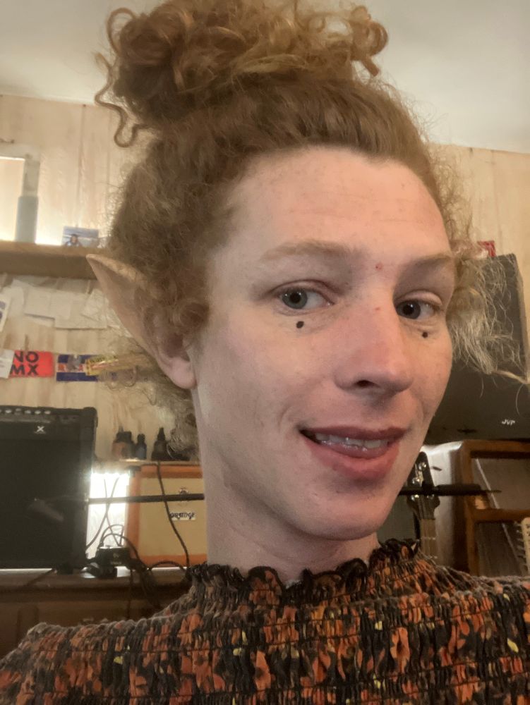 Trans girl feels cute while wearing nerdy elf ears 