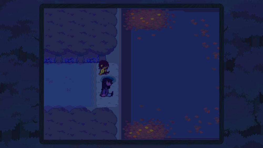 Kris and Susie sit together by the lake in the darkness.