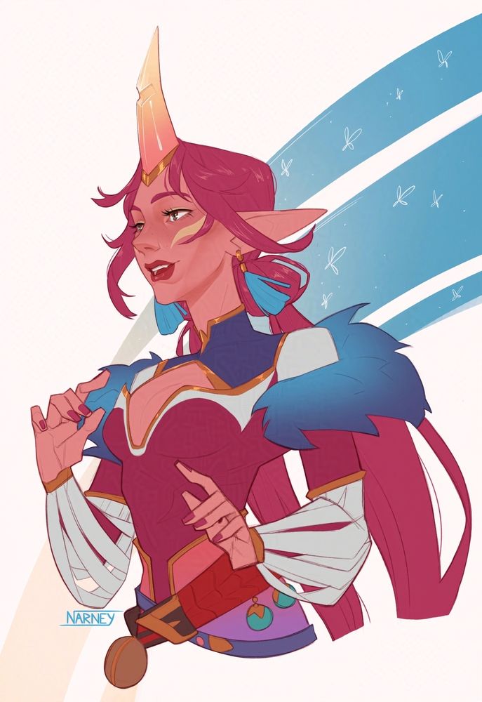 Rielli - A half 3/4 half body of a pink female character with pointy ears and a big horn on her forehead, like a unicorn. She has long pink hair in buns with long strands coming out behind. She wears blue fringe earrings and a pink outfit with blue furr on the shoulders. 