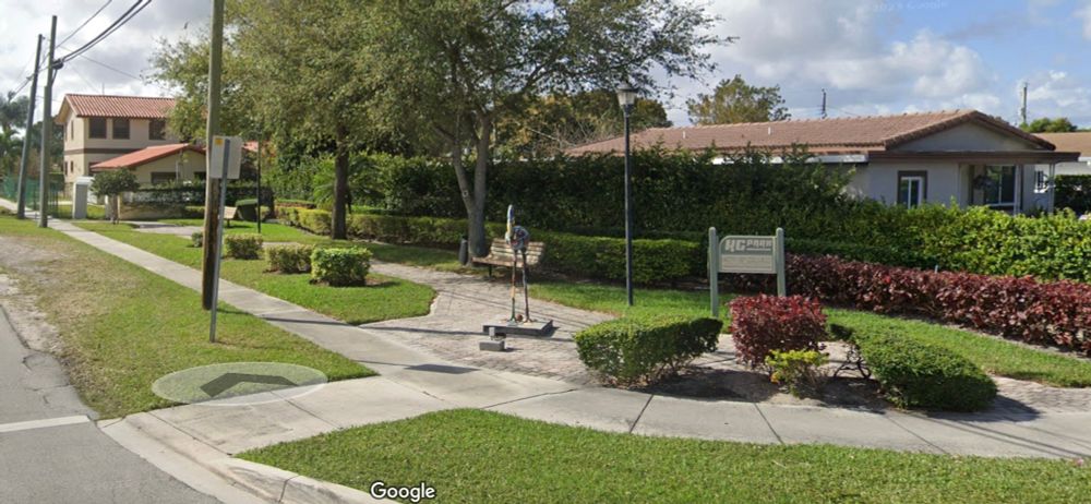KC Park in Hialeah with park sign in the foreground