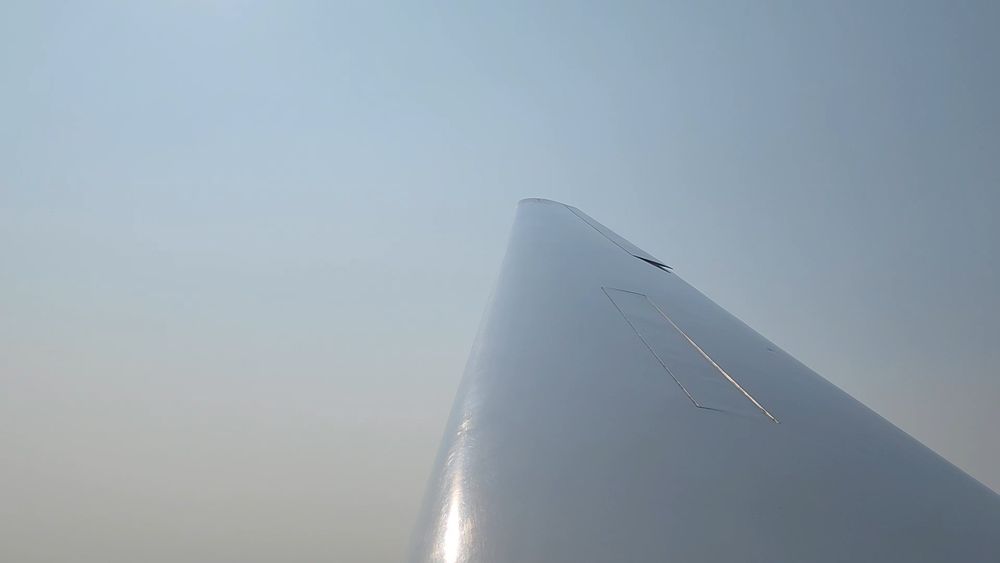 Hazy smoky sky out the cockpit window 