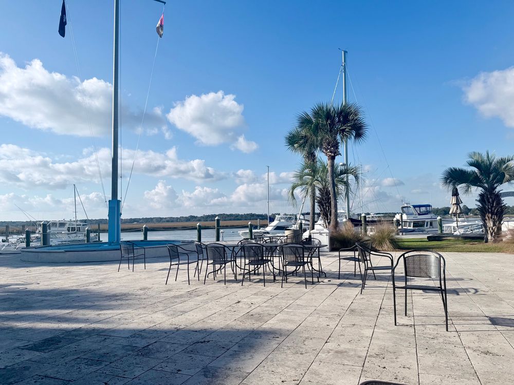 Peaceful view of marina with boats and marshland. Not pictured: 55 pound psychopath field golden retriever. 