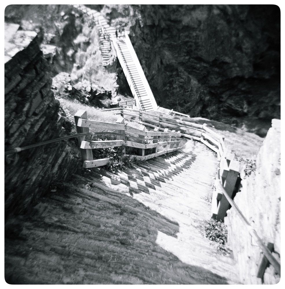 A black and white image of, Steps to Tintagel Castle.