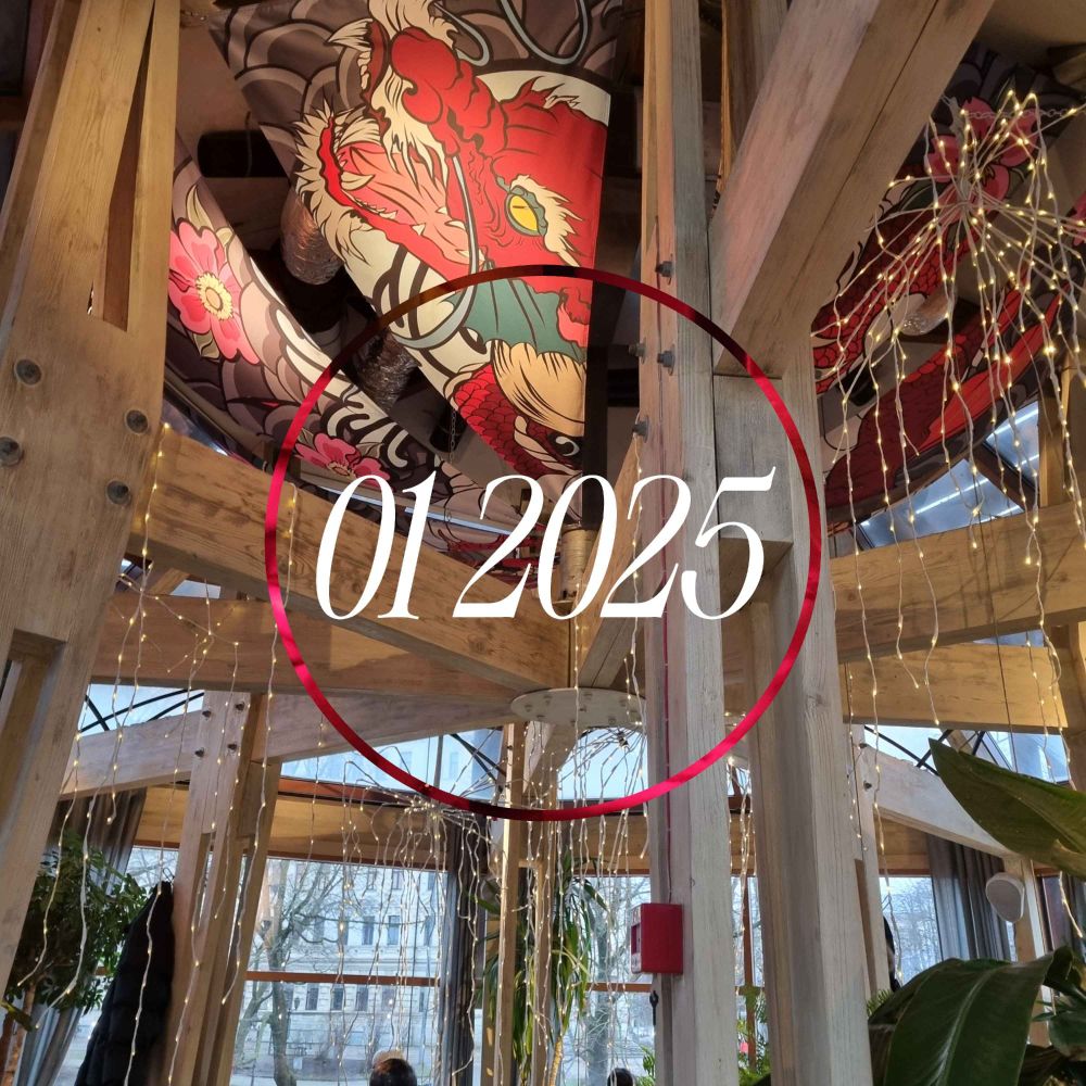 view of a cafe ceiling decorated with wooden beams and a printed drape of a red dragon. there are fairy lights hanging from the beams.
the cafe itself seems very airy, its walls are glass and there are plants visible inside. 
the title of the playlist (the numbers 01 2025) is in a "see you later space cowboy" reminiscent font in white, surrounded by a red -and-black circle in the middle of the image. 