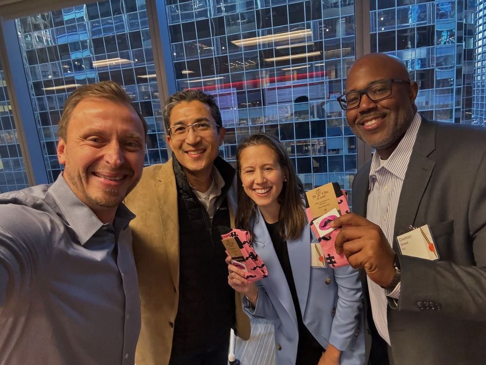 Larry Gioia and friends flaunting Pinksocks and starting another conversation on the power of kindness, gifting and empathy. 