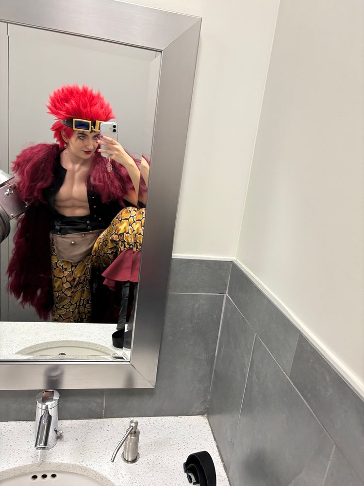 Eustass Captain Kidd from One Piece Cosplay photo taken in a bathroom mirror.