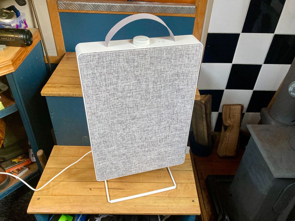 lovely IKEA air purifier - a white plastic upright box with grey cloth screen on the front