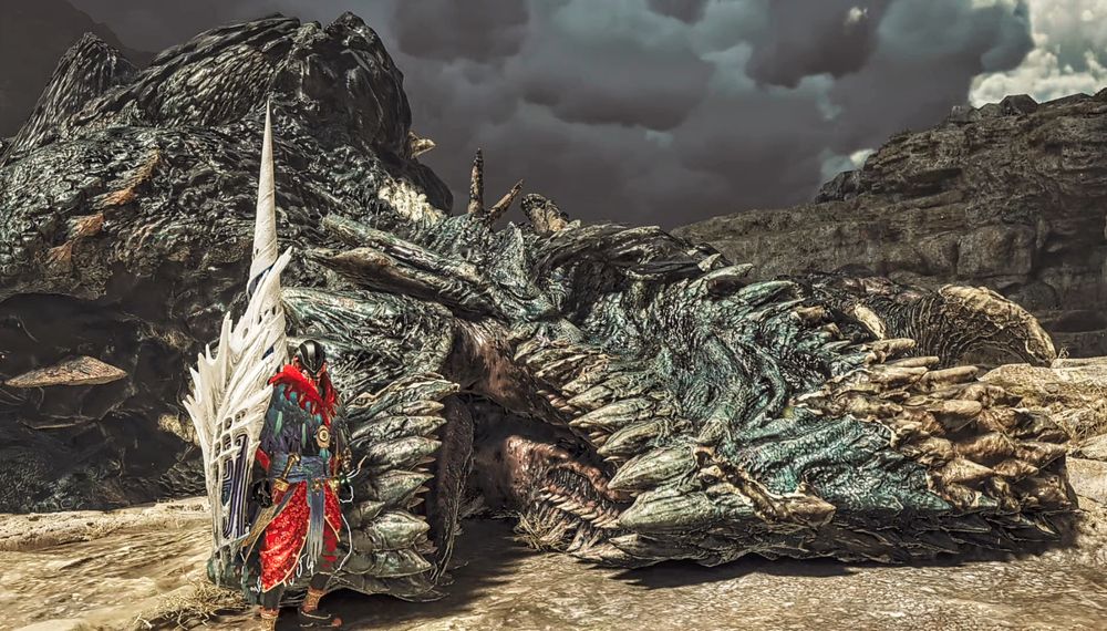 A proud hunter with a Zoh Shia lance posing in front of a slayed Gogmazios