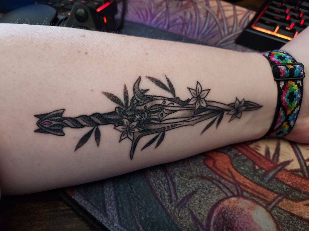 tattoo of the dagger Rhapsody from Baldur's Gate 3