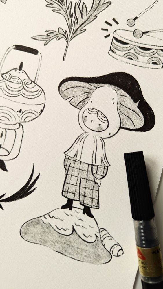 Little Mushroom Character drawn with a black brush pen.