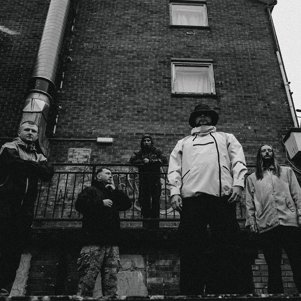 Black and white photo of the band Malevolence.