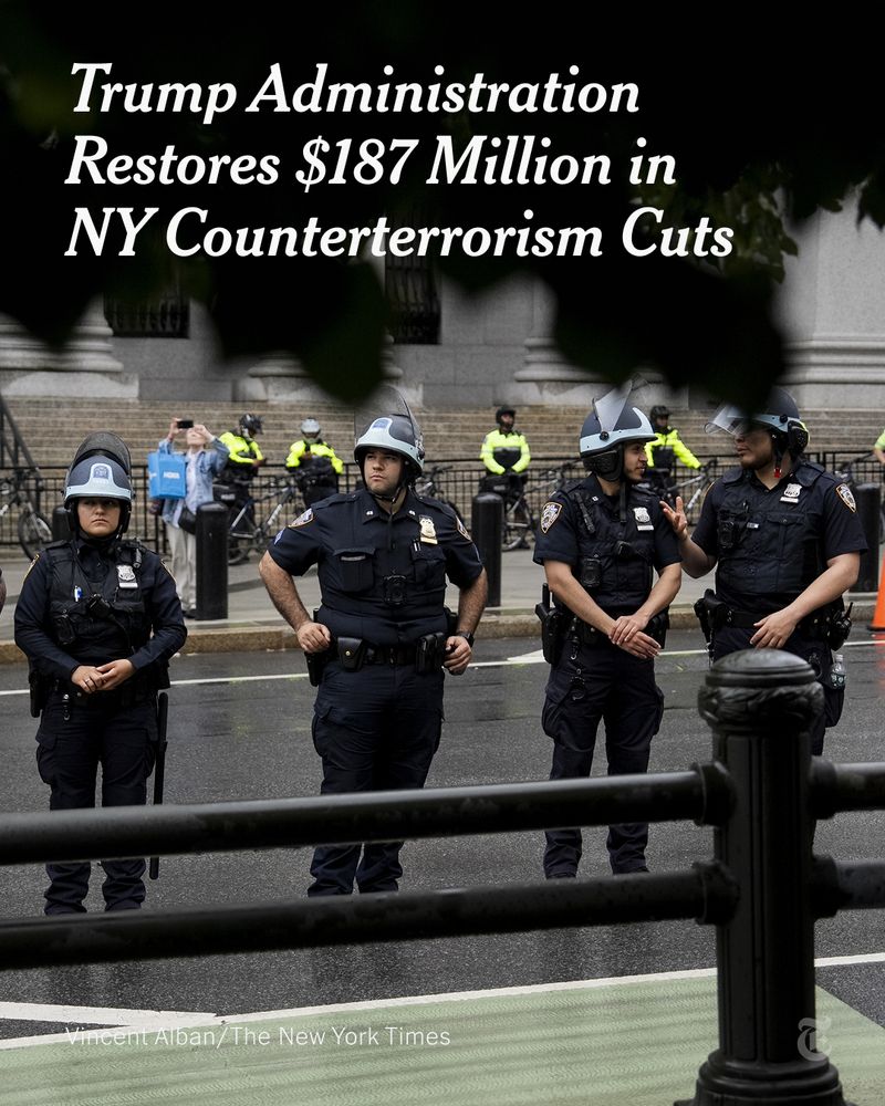 NYPD officers stand in a line wearing helmets. A headline reads: "Trump Administration Restores $187 Million in NY Counterterrorism Cuts." Photo credit: Vincent Alban/The New York Times.