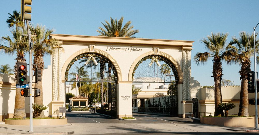 The merger catapults new power players to the top of Hollywood and ends a tortuous process that has lasted well over a year.
