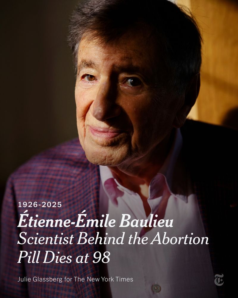 A portrait photo of Étienne-Émile Baulieu, an older man wearing a purple and blue checkered suit. A headline reads: "1926-2025: Étienne-Émile Baulieu, Scientist Behind the Abortion Pill, Dies at 98." Julie Glassberg for The New York Times.