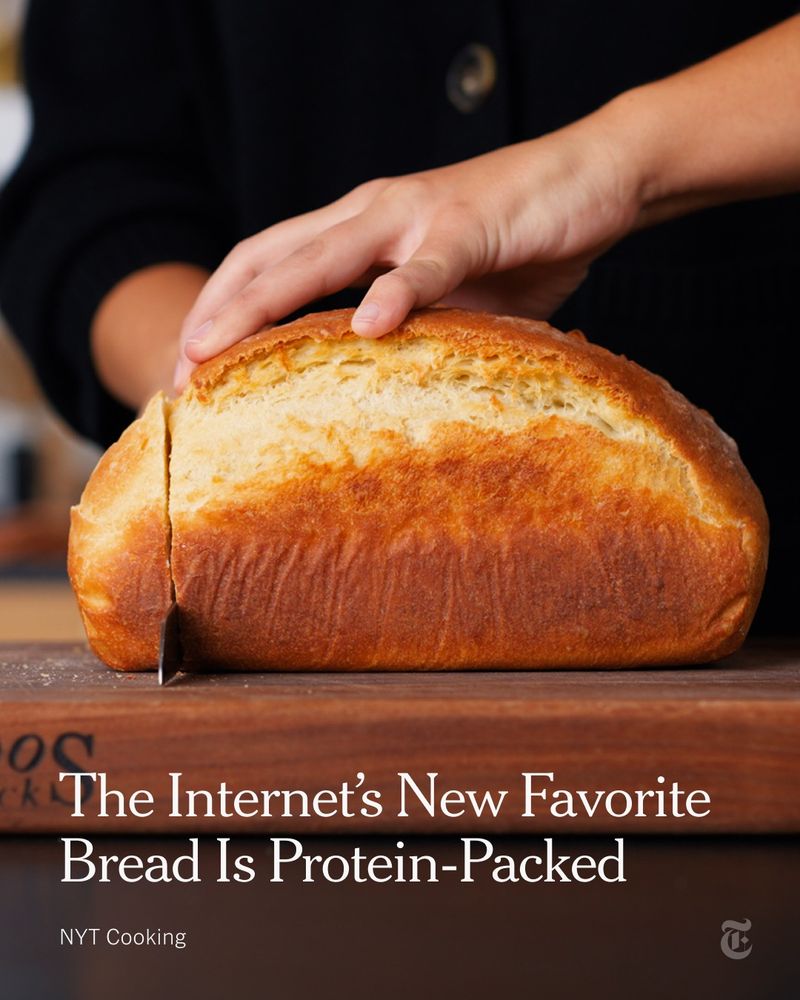 Someone cuts through a loaf of bread. Headline: The Internet's New Favorite Bread Is Protein-Packed