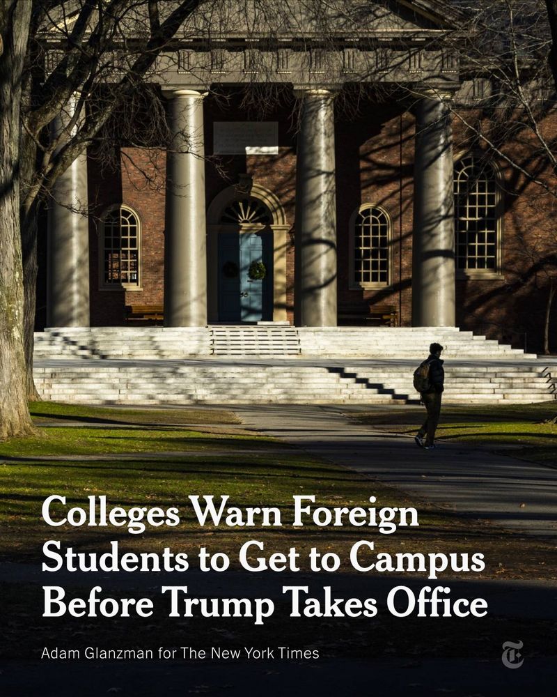 A person is pictured walking in front of a building with pillars on Harvard University’s campus in Cambridge, Massachusetts. Headline reads: "Colleges Warn Foreign Students to Get to Campus Before Trump Takes Office." Photo credit: Adam Glanzman for The New York Times. 