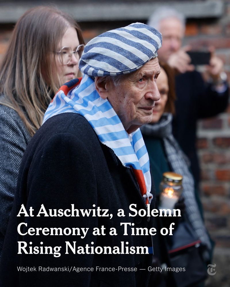 Holocaust survivor Stanislaw Zalewski wearing a striped hat and scarf carrying a candle during commemorations on the 80th anniversary of the liberation of the German Nazi concentration and extermination camp Auschwitz-Birkenau by the Red Army. Photo credit: Wojtek Radwanski/Agence France-Presse — Getty Images