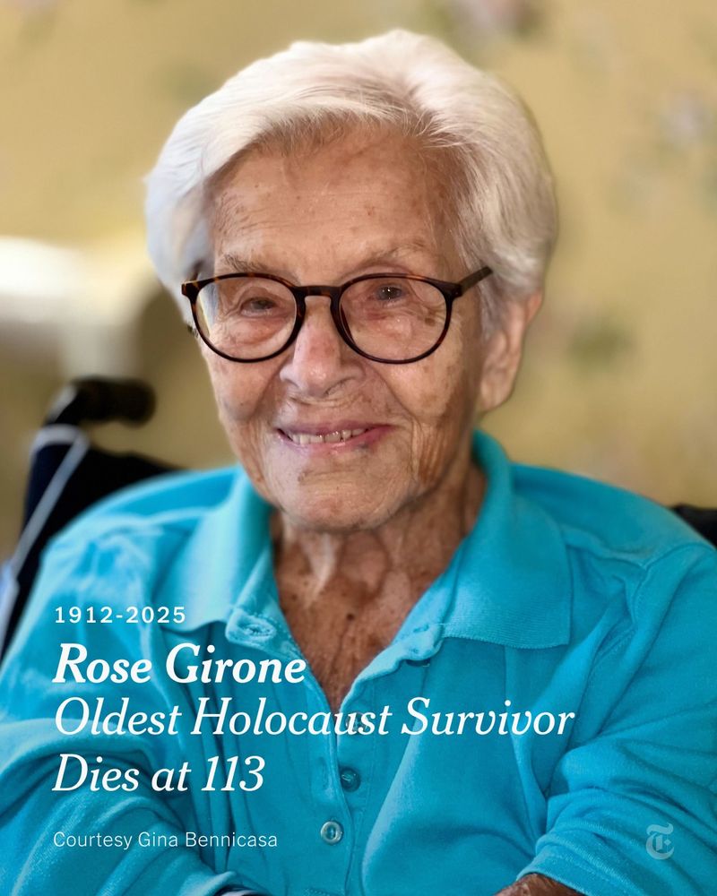 Rose Girone as an older woman with white hair and black glasses, dressed in a blue shirt. She is seated and smiling. Text reads: "1912-2025. Rose Girone. Oldest Holocaust Survivor. Dies at 113." Photo credit: Courtesy Gina Bennicasa