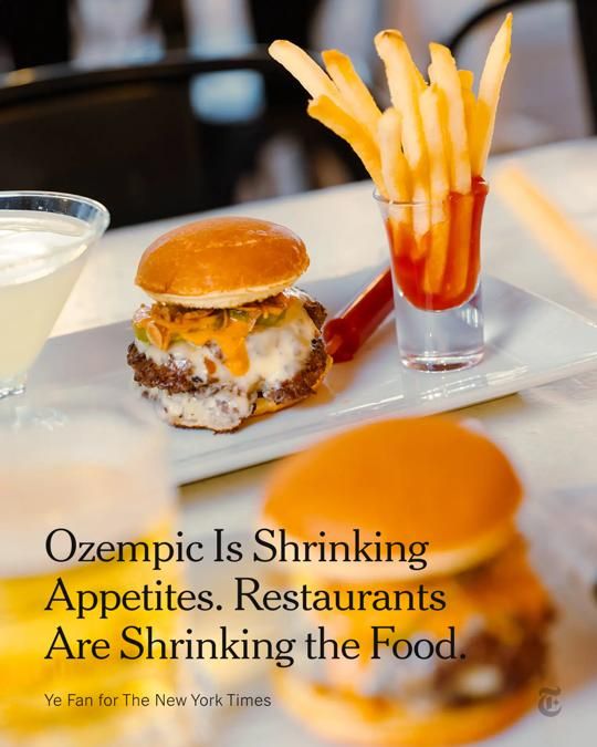 A photo shows a mini burger, martini and French fries in a shot glass. Text overlay: Ozempic Is Shrinking Appetites. Restaurants Are Shrinking the Food.