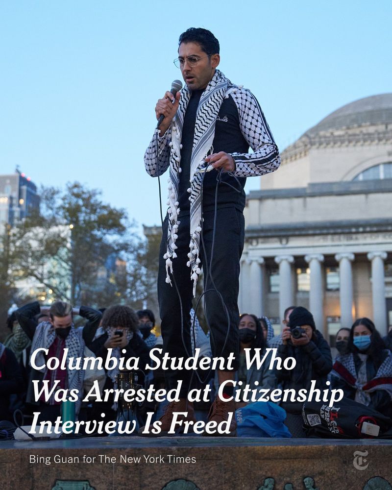Mohsen Mahdawi wearing a keffiyeh scarf as he stands atop a platform, surrounded by people. The text reads: "Columbia Student Who Was Arrested at Citizenship Interview Is Freed." Photo by Bing Guan for The New York Times.