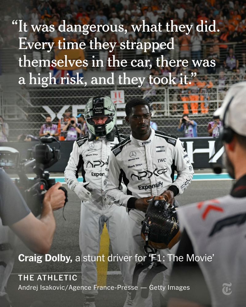 The actors Brad Pitt and Damson Idris in uniform filming a scene on a race track for the movie F1. A quote reads: 