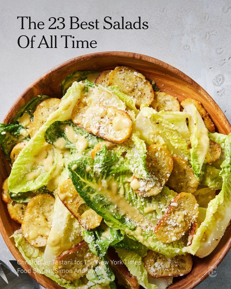 A wooden bowl of salad with the headline: The 23 Best Salads of All Time