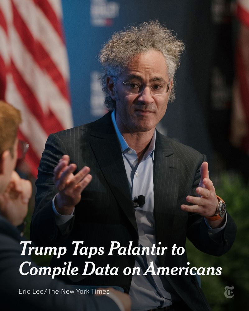 Alex Karp in a dark jacket and collared shirt, gesturing with his hands. Text reads: "Trump Taps Palantir to Compile Data on Americans." Photo by Eric Lee/The New York Times 
