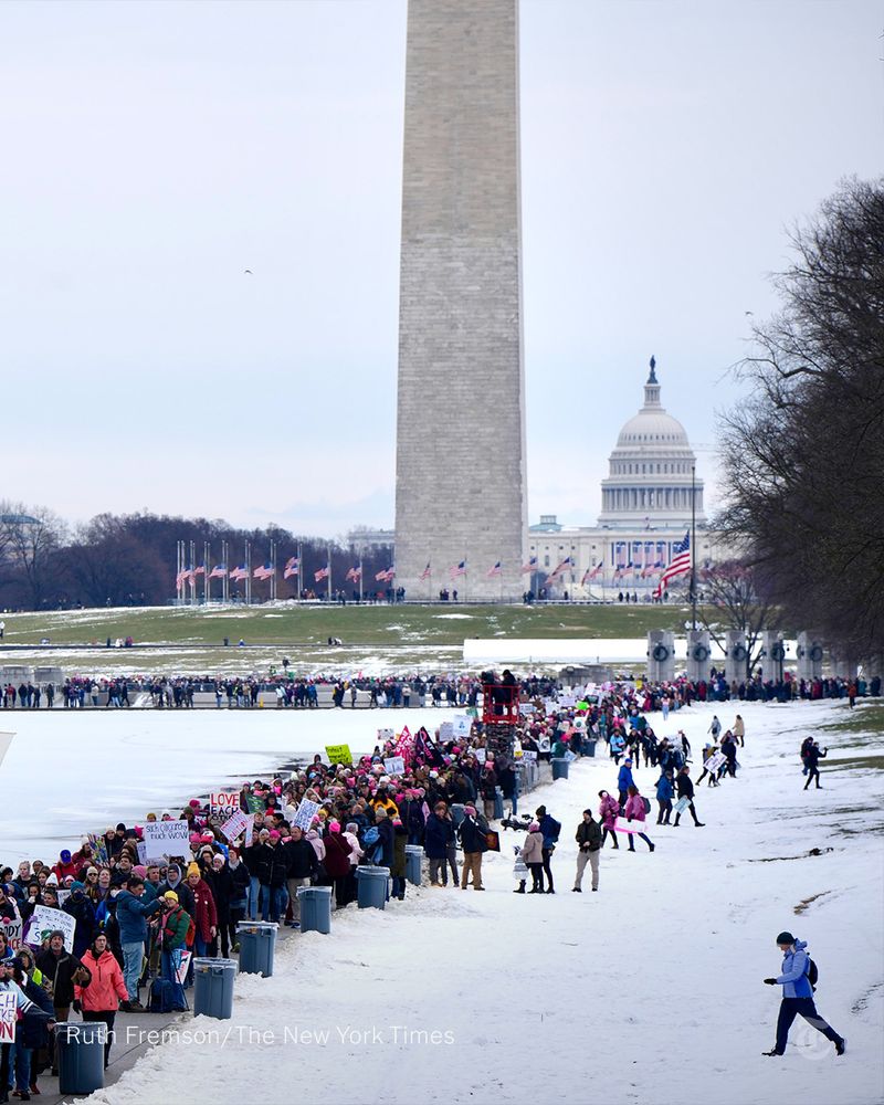 A crowd of marchers in front of the Washington Monument 