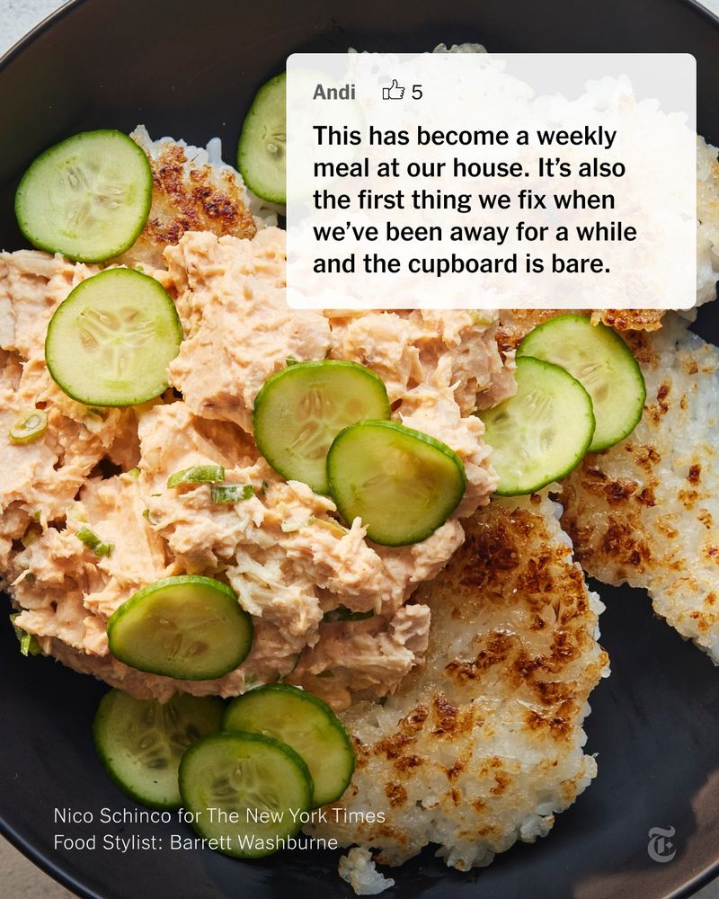 A close-up of a bowl of spicy tuna and cucumber salad with crispy rice. A comment from a reader Andi: "This has become a weekly meal at our house. It's also the first thing we fix when we've been away for a while and the cupboard is bare."