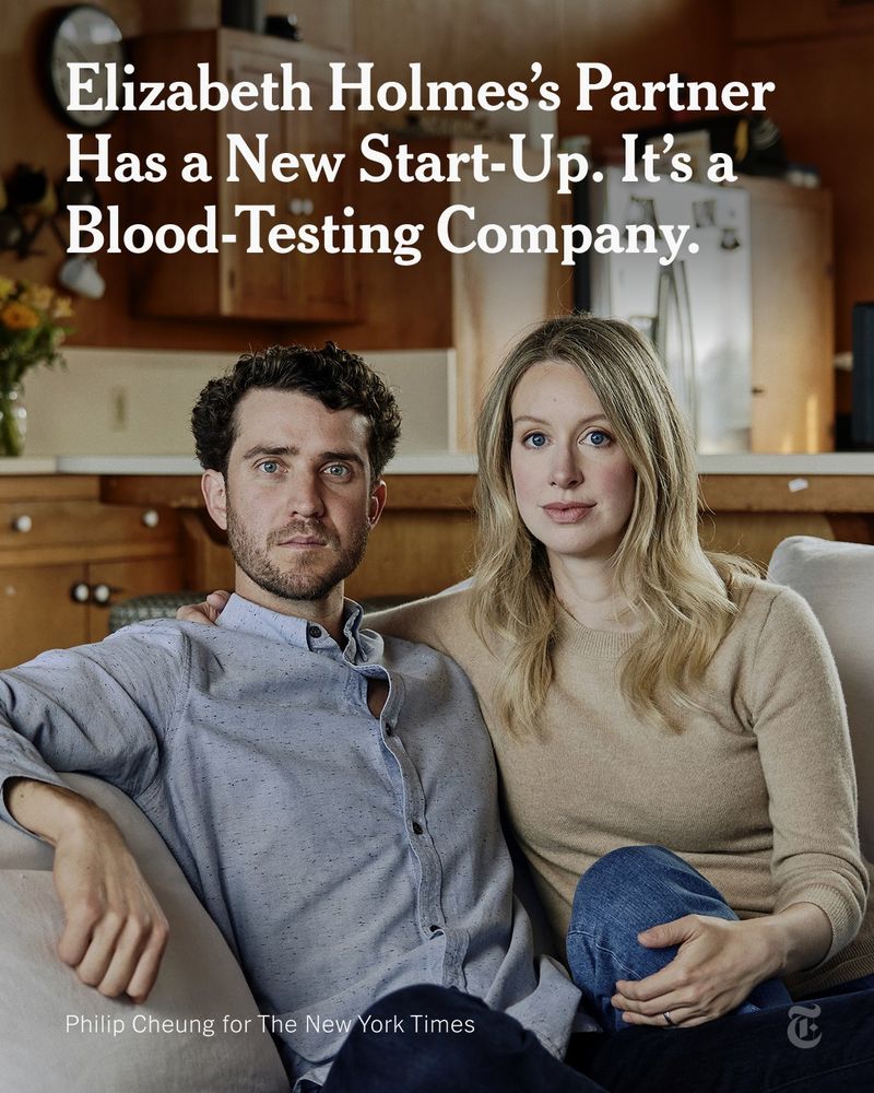 Elizabeth Holmes and Billy Evans, sitting closely on a couch. A headline reads: 