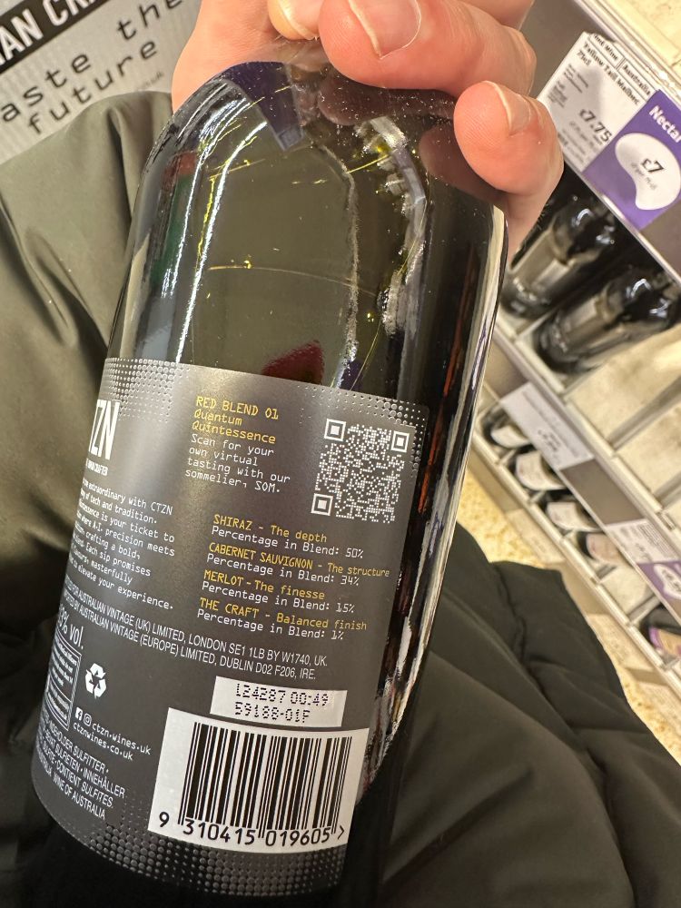 Back of a wine bottle showing amount of different grapes in the blend
