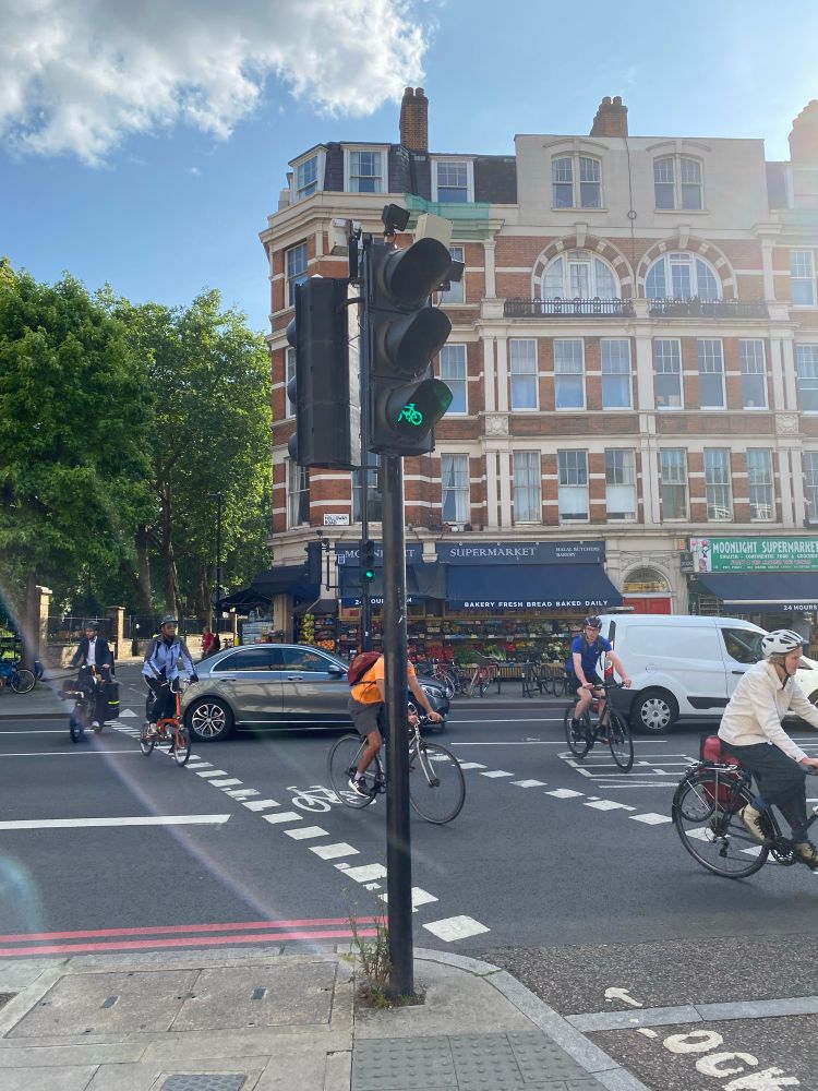 Car sitting on cycle lane when cycle lights are green