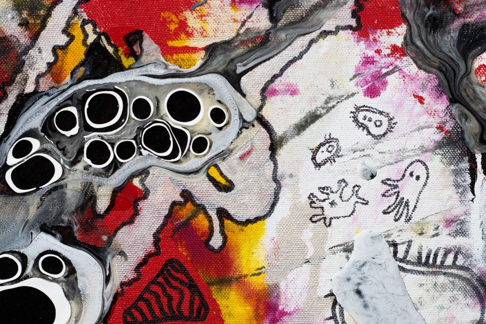 detail image of the painting from just to the upper left of the center of the painting. Features black-in-white concentric circles in gloss poured medium, silver streaks outlined in black marker, and little doodles of Space Octopus, a Swimming Marm, and two cellular forms.