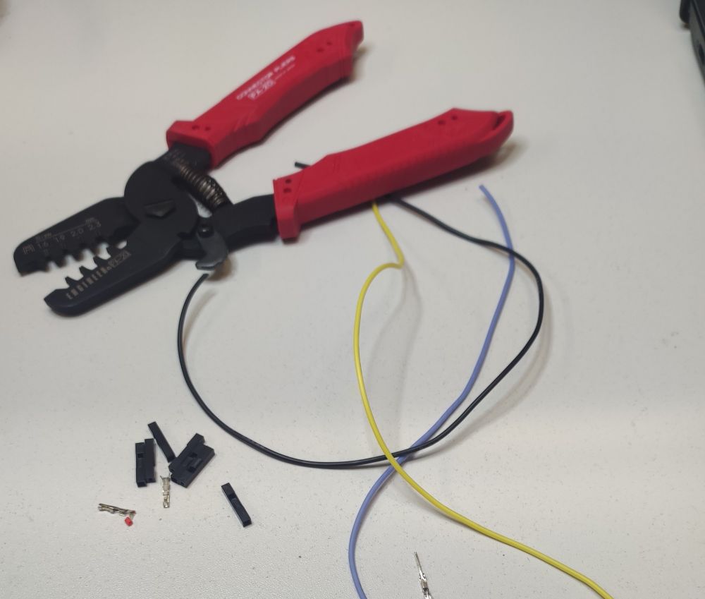 Crimp tool with cables and pin headers